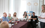 Maggie Fischer of CCRA speaks to a small group of travel advisors during another Boardroom Presentation.