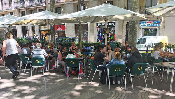 A McDonald’s restaurant on Las Ramblas, the tree-lined pedestrian mall where many cruisers and beachgoers enter the city. A McDonald’s restaurant on Las Ramblas, the tree-lined pedestrian mall where many cruisers and beachgoers enter the city.