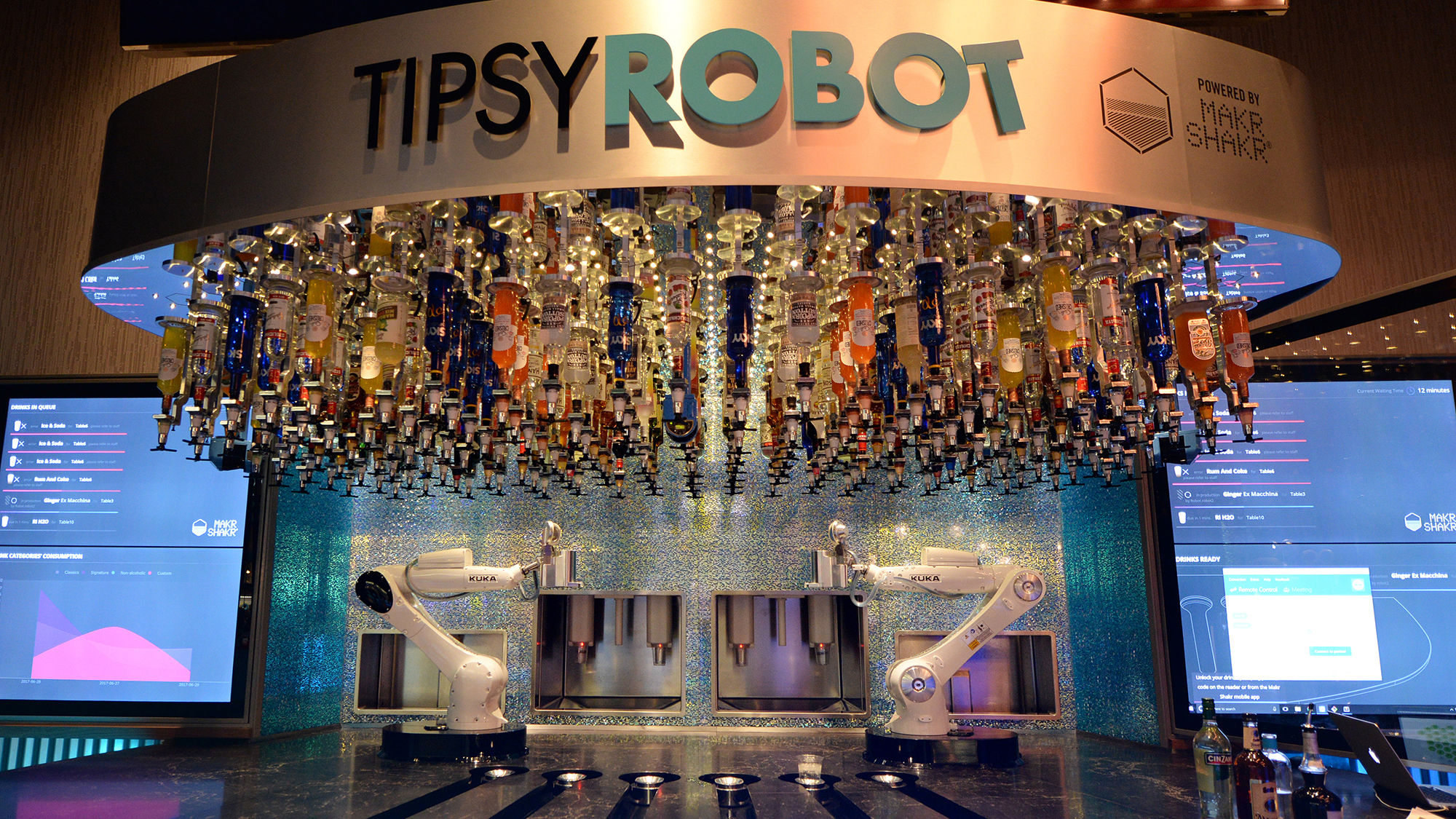 At Tipsy Robot, robotic arms mix margaritas and mai tais for guests who order via tablet.