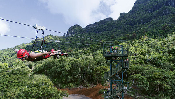 Outfitters Kauai’s AdrenaLine Kauai Zipline Course includes the Kauai FlyLine, Hawaii’s longest zipline at over three-quarters of a mile. Outfitters Kauai’s AdrenaLine Kauai Zipline Course includes the Kauai FlyLine, Hawaii’s longest zipline at over three-quarters of a mile.