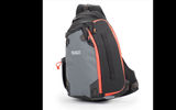 The PhotoCross 13 Sling bag camera carrier can handle an unwrapped DSLR and a tripod; up to four lenses, including a 70-200mm lens; and some 13-inch laptops. It is water repellant/resistant and has weather-resistant zippers as well as removable foam dividers. Other features include a three-point harness that allows for easy rotation and access to gear; a tuck-away waist belt; water bottle pockets; internal zippered pockets for batteries, memory cards and the like; top and side carry handles; and a seam-sealed rain cover.