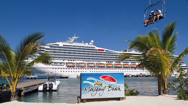 Carnival Cruise Line, which plans to build a beach destination on Grand Bahama island, already has a custom-built port at the island of Roatan in Honduras.