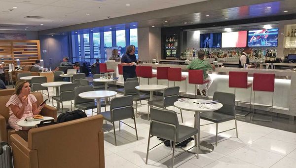 The upgraded bar and dining area at the newly remodeled Admirals Club at Miami Airport. The upgraded bar and dining area at the newly remodeled Admirals Club at Miami Airport.