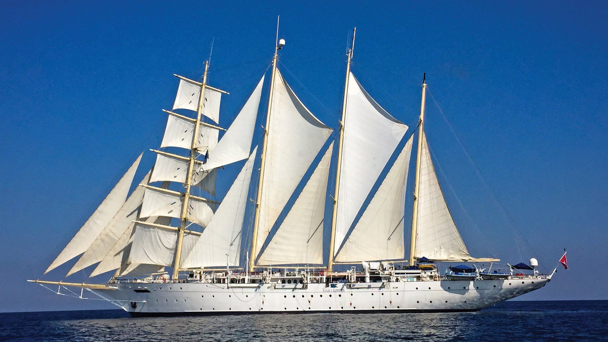 The Star Clipper has four masts and under full sail deploys 16 sails using lines hauled by hand or electric winch.