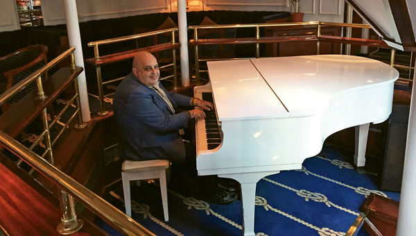 The ship’s piano lounge, the center of onboard social life.
