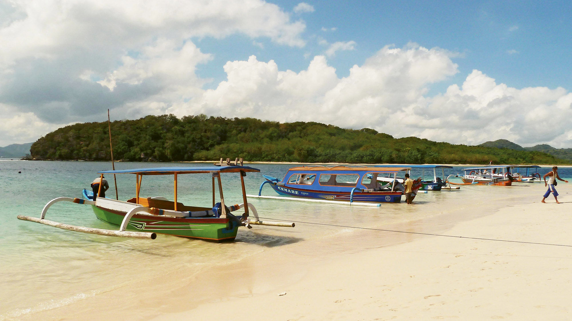 Boats on Gili Nanggu, among the small islands visited on a Star Clipper sailing in Indonesia.