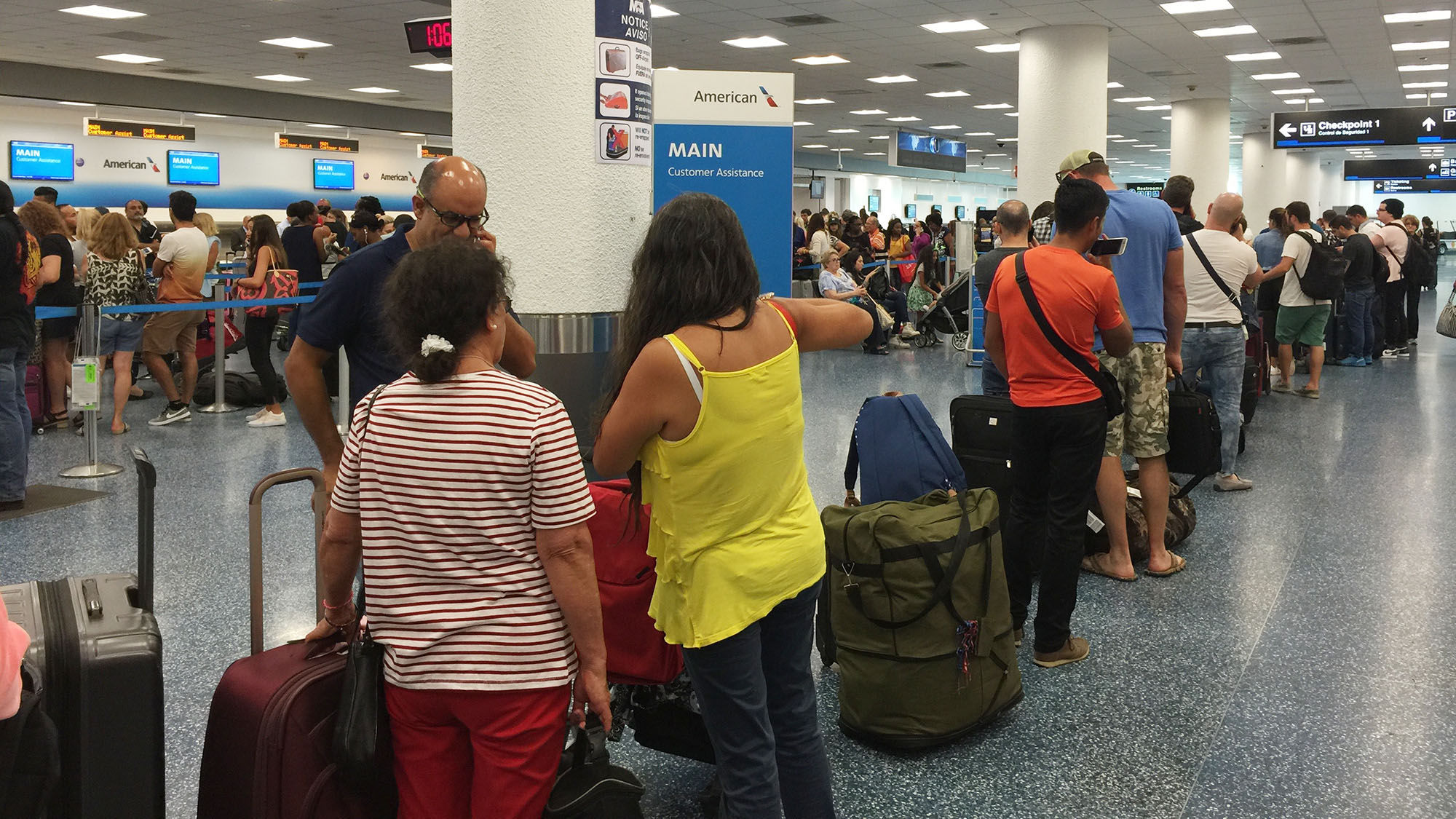 Long lines formed at the American Airlines counter at Miami's airport on Wednesday.