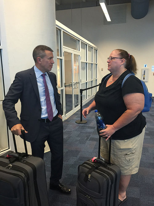 Norwegian Cruise Line CEO Andy Stuart talks with Charlene Woolley, an Atlanta resident on vacation in St. Thomas when Hurricane Irma hit. Norwegian Cruise Line CEO Andy Stuart talks with Charlene Woolley, an Atlanta resident on vacation in St. Thomas when Hurricane Irma hit.