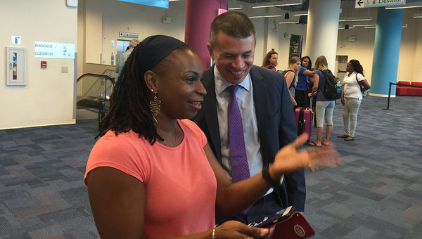 Hurricane Irma evacuee Arlene Graham shares a photo of the storm with Norwegian Cruise Line CEO Andy Stuart at PortMiami. Hurricane Irma evacuee Arlene Graham shares a photo of the storm with Norwegian Cruise Line CEO Andy Stuart at PortMiami.