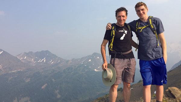 The writer and his 16-year-old son commemorate reaching the highest point of a challenging hike with a photo. The writer and his 16-year-old son commemorate reaching the highest point of a challenging hike with a photo.