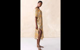 This destination-inspired fashion represents one of travel photographer Lisa Limer's global images digitally captured on pure silk, in this instance original photos of Moorish architecture in Andalusia, Spain. The result: unique and beautiful garments that capture the essence of the countries and regions that are the source of their inspiration. And while international in appeal, all Bela Monde apparel is designed and sewn in America. The Granada Caftan features V-neck piping front and back, shoulder cut-outs, side slits and a silk tie belt.