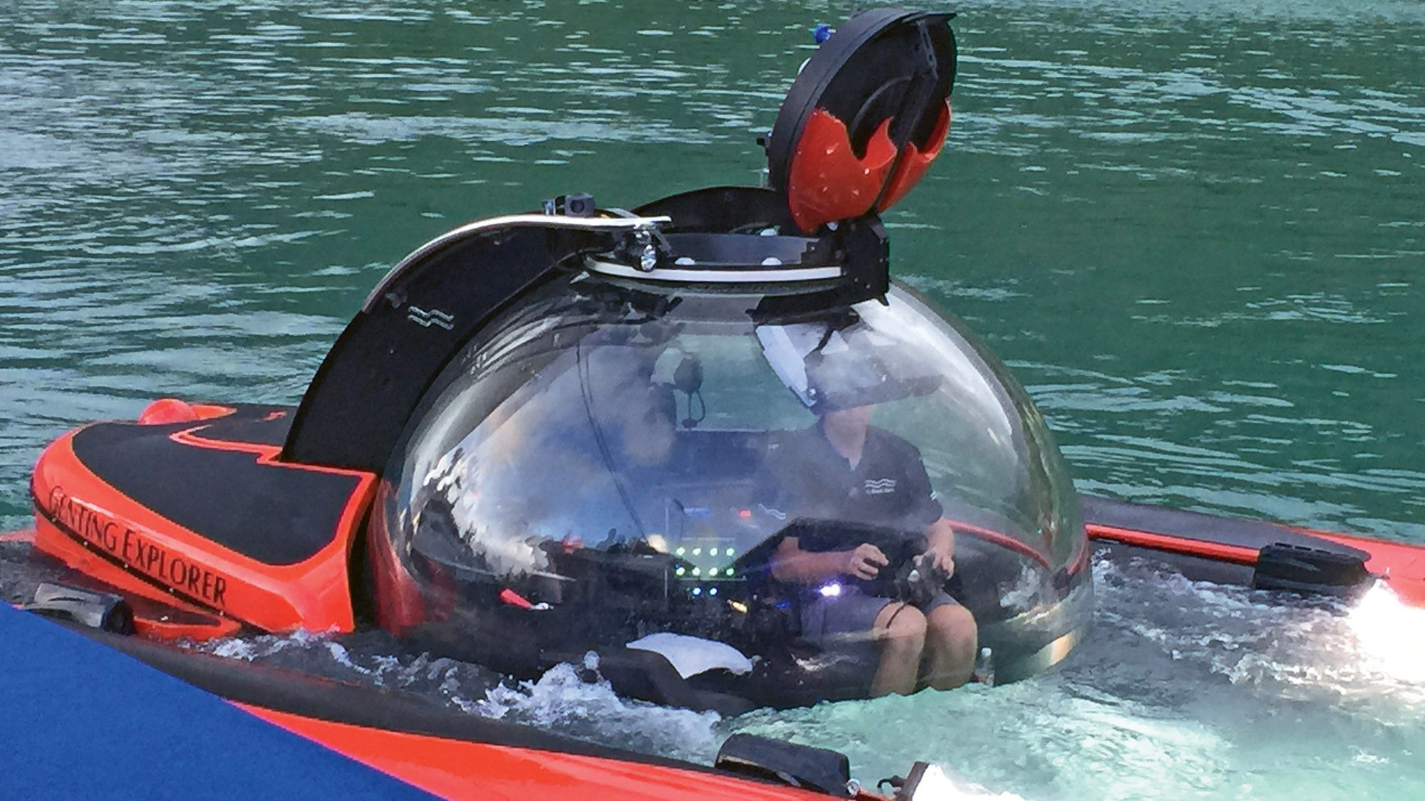The Genting Explorer, shown here in the Seychelles, carries two passengers plus a pilot.