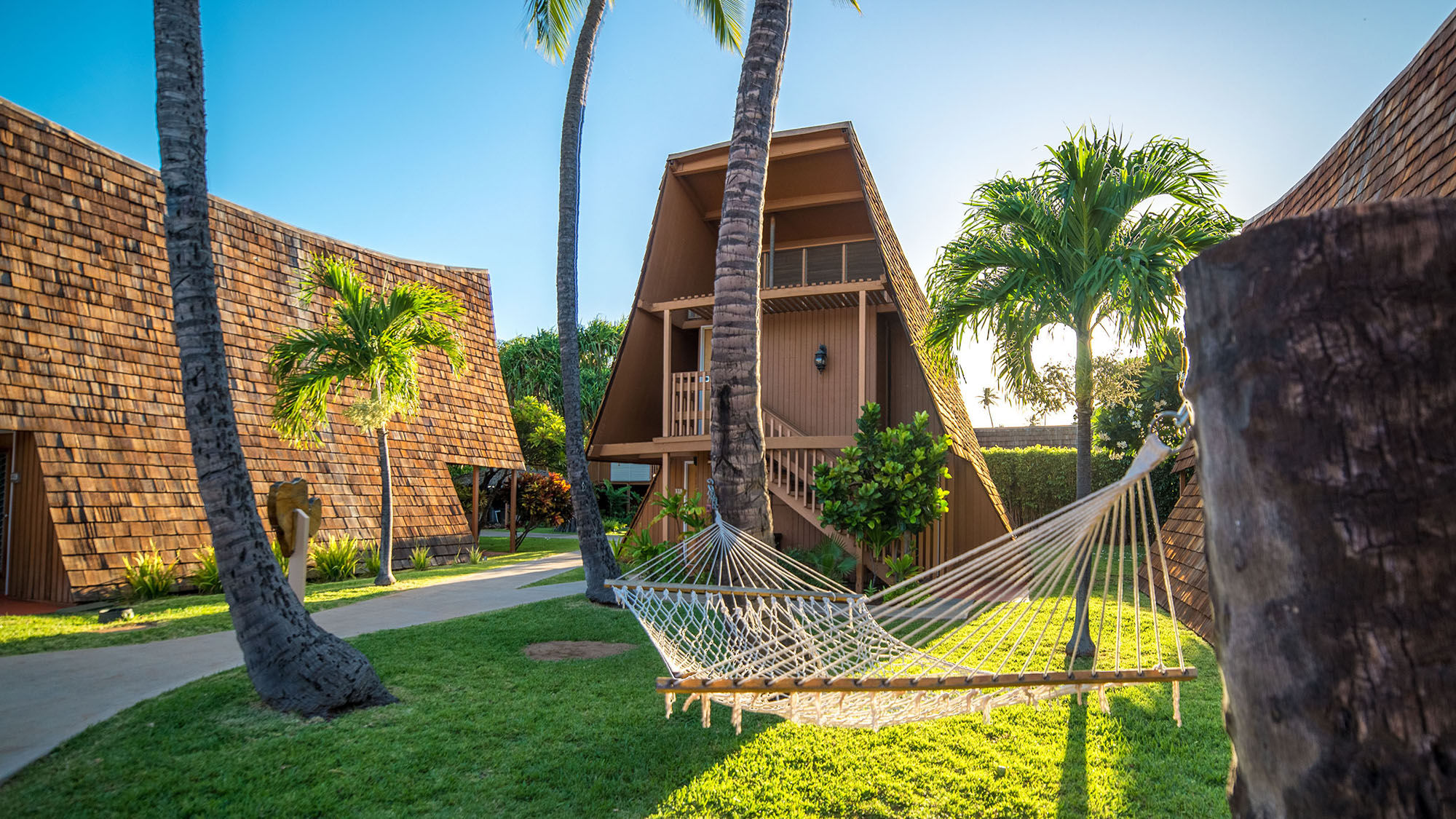 Hotel Molokai is made up of 12 Polynesian-style bungalow buildings with private patios and balconies steps away from a reef-lined beach.