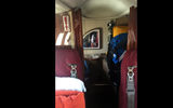 At the very back of the plane behind passenger seats is a bathroom.