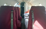 The cockpit of the Learjet is open to the cabin, unlike on commercial flights.