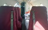The cockpit of the Learjet is open to the cabin, unlike on commercial flights.