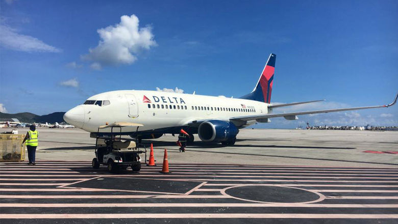 A Delta jet at Princess Juliana Airport.