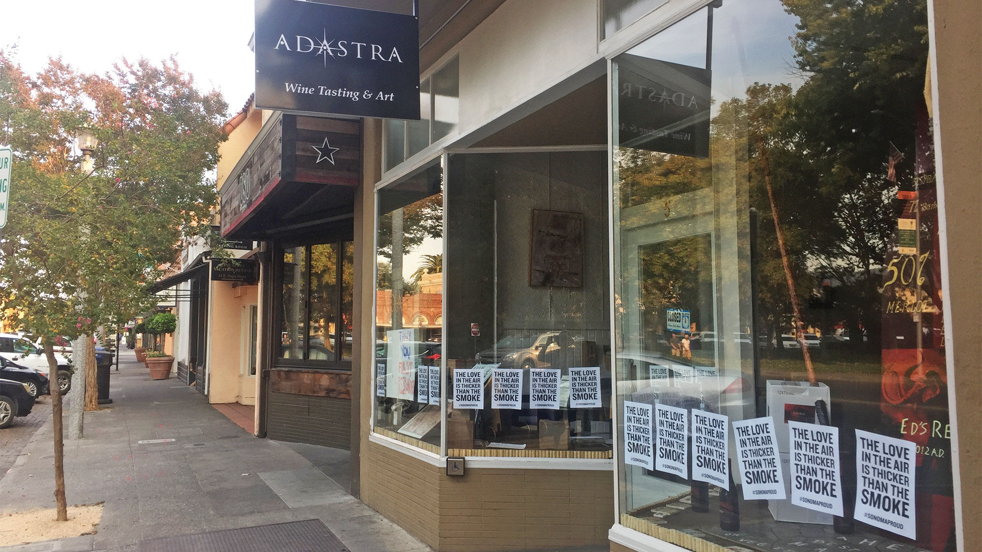 A business in Sonoma posted signs saying “The love in the air is thicker than the smoke.”
