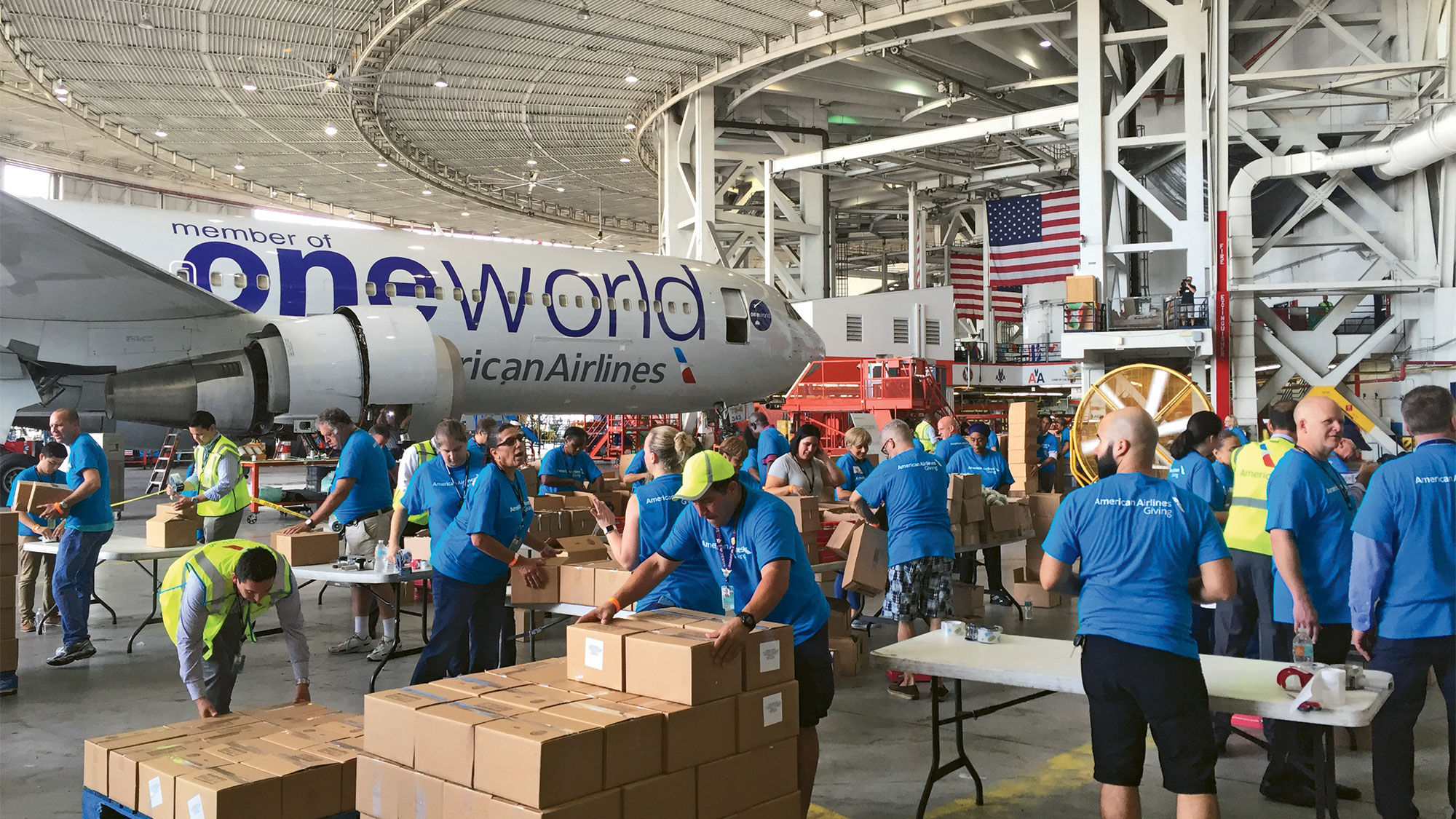An American Airlines crew readies relief supplies for a flight from Miami Airport.