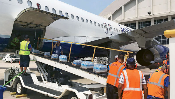 Relief supplies being unloaded from a JetBlue relief flight in Aguadilla after Hurricane Maria. Relief supplies being unloaded from a JetBlue relief flight in Aguadilla after Hurricane Maria.