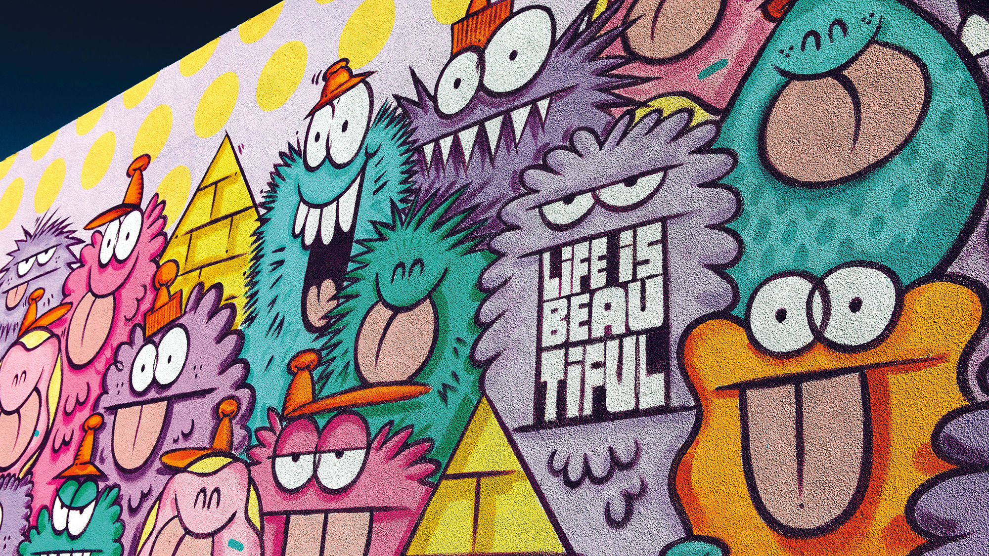 At Life Is Beautiful Festival, street artists like Kevin Lyons painted large-scale murals on the walls of downtown Las Vegas.
