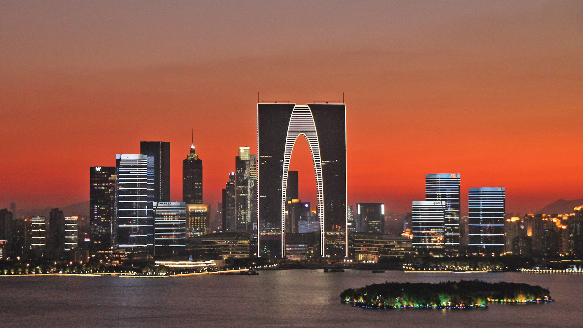 The Gate to the East dominates the skyline from Jinji Lake. Suzhou’s gardens, waterways and rich cultural history make for a rewarding destination.
