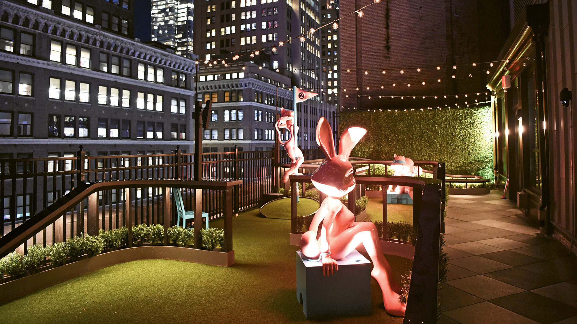 The 612-room Moxy Times Square opened in September. Pictured, the Magic Hour rooftop lounge.