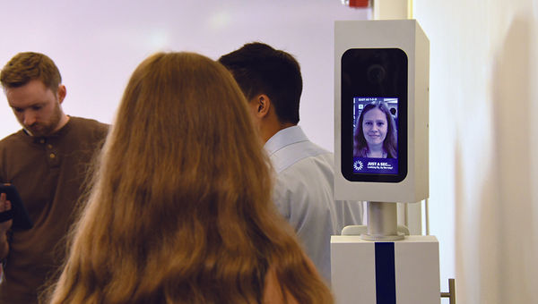 A passenger’s face is recorded and used instead of a boarding pass during the trial this summer.