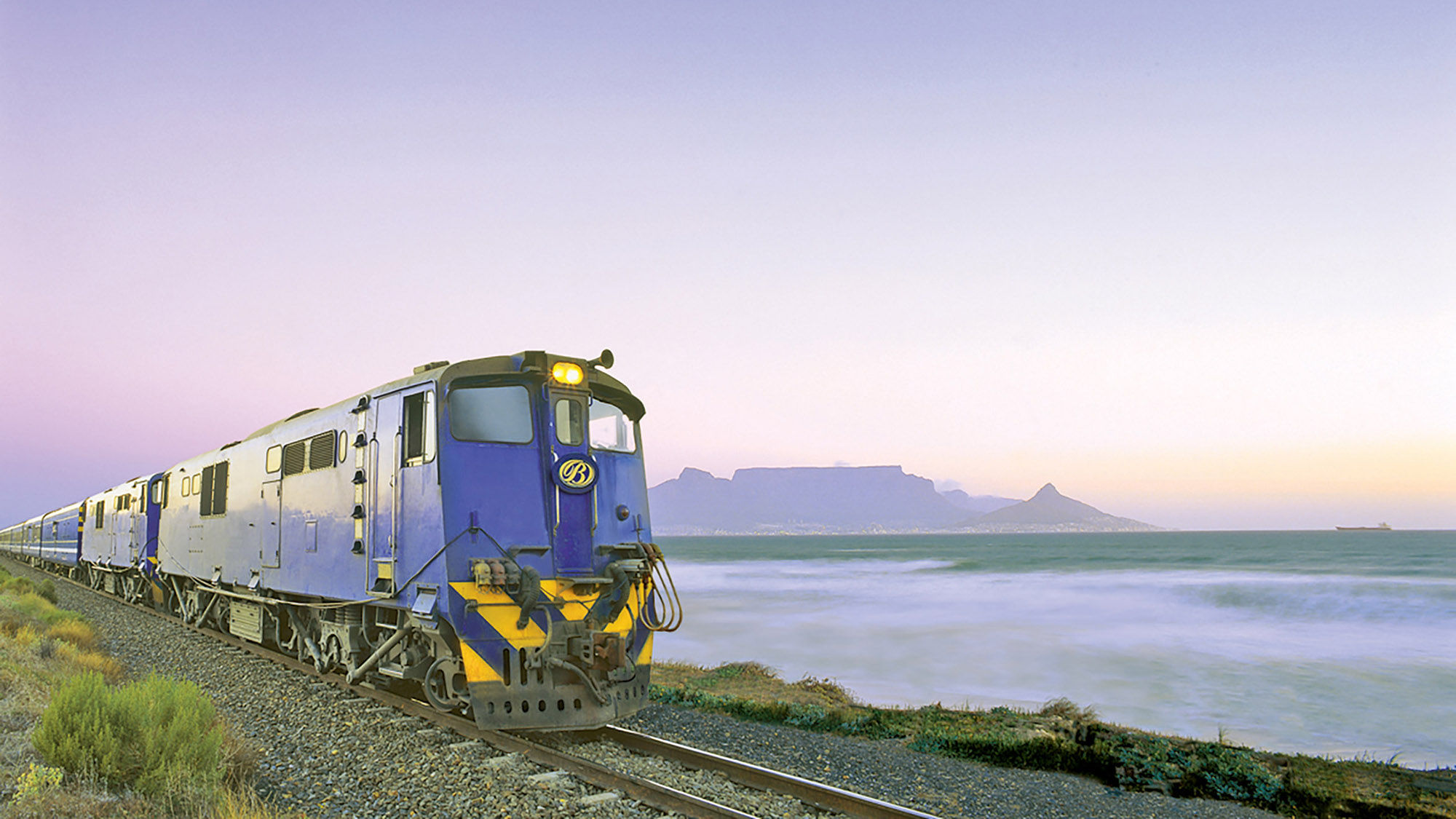 Passengers on the Blue Train can take in South Africa’s diverse landscapes while ensconced in comfort and luxury.