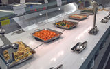 The hot and cold buffet will offer seasonal and fresh items. Among the choices at the opening party were crab mango salad, mojo salmon, coconut green spinach and locally sourced meats and cheeses.