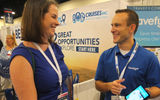 Travefy's Scott Rutz explains his product to Rebecca Vogt, an agent with the Cruise Captain based in Tampa.
