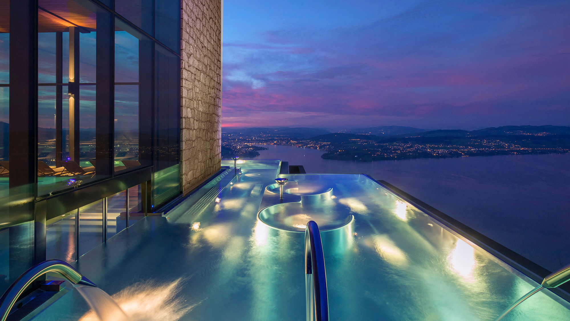 The outdoor infinity-edge pool, one of three pools at the Alpine Spa at Burgenstock Hotels & Resort Lake Lucerne.