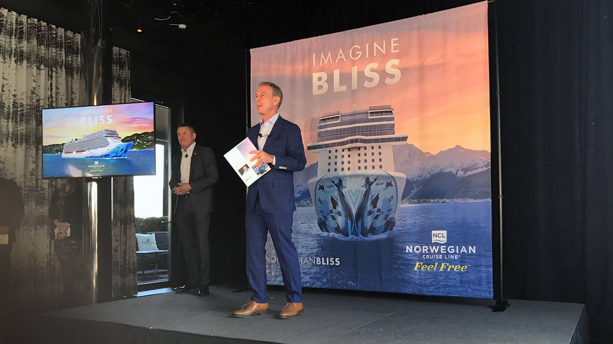Norwegian Bliss godfather Elvis Duran speaking at an event Wednesday. Norwegian Cruise Line CEO Andy Stuart looks on.
