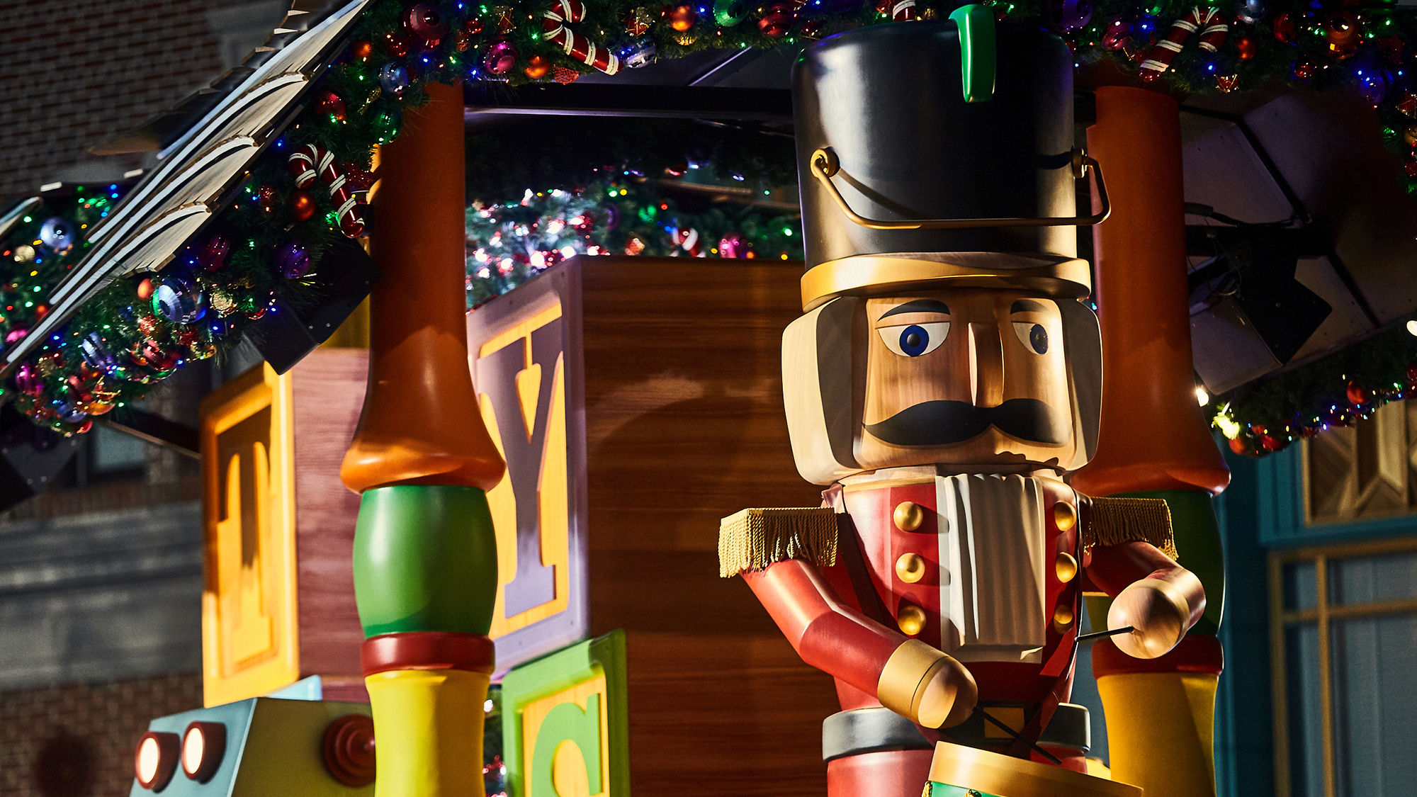 A toy soldier float in Universal's Holiday Parade featuring Macy's.