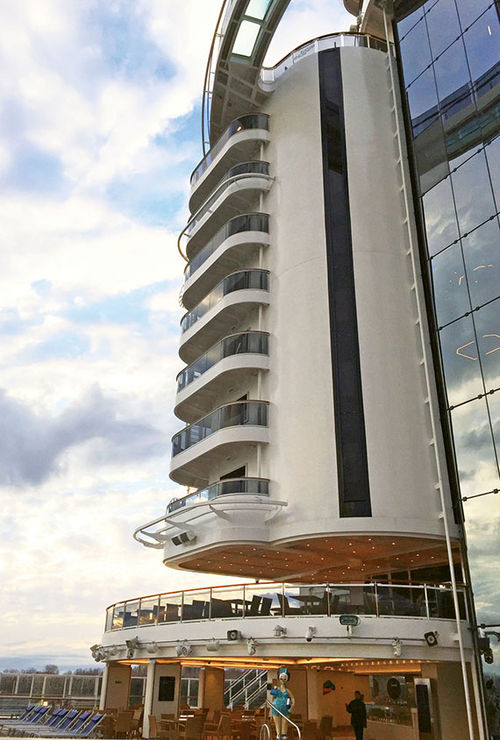 The Seaside features aft Aurea suites with wraparound balconies evocative of Miami Beach condo towers. The Seaside features aft Aurea suites with wraparound balconies evocative of Miami Beach condo towers.