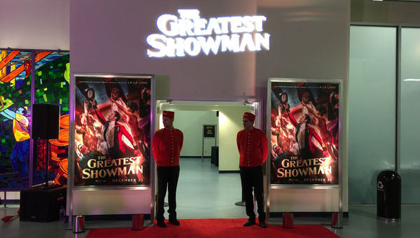 Cunard cabin attendants at the entry to the gangway for "The Greatest Showman" premiere aboard Queen Mary 2. Cunard cabin attendants at the entry to the gangway for "The Greatest Showman" premiere aboard Queen Mary 2.