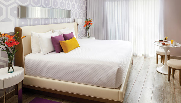 A guestroom in the Essence section of Azul Beach Resort The Fives. A guestroom in the Essence section of Azul Beach Resort The Fives.