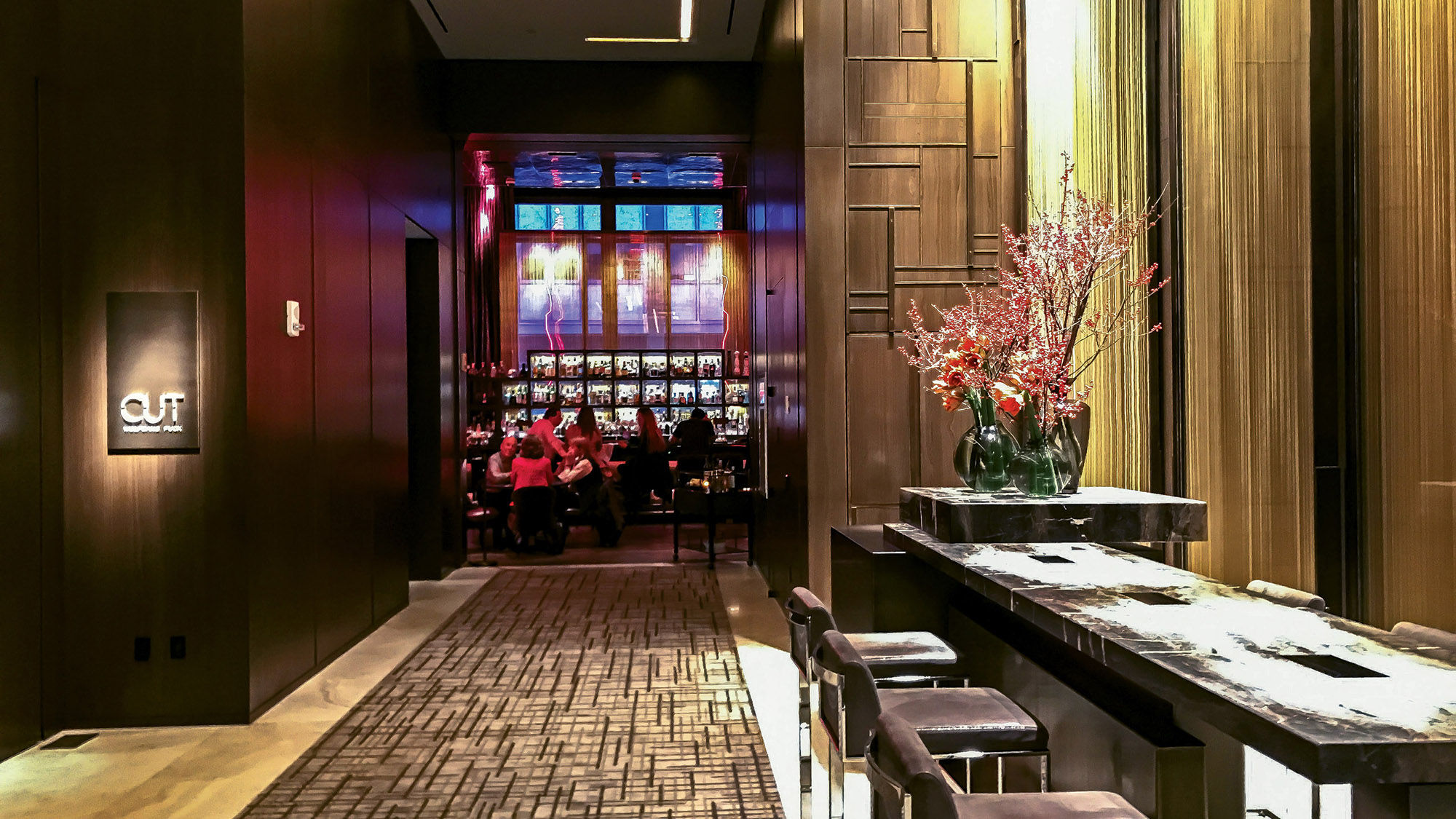 The lounge at Cut by Wolfgang Puck is the de facto lobby bar at the Four Seasons New York Downtown.