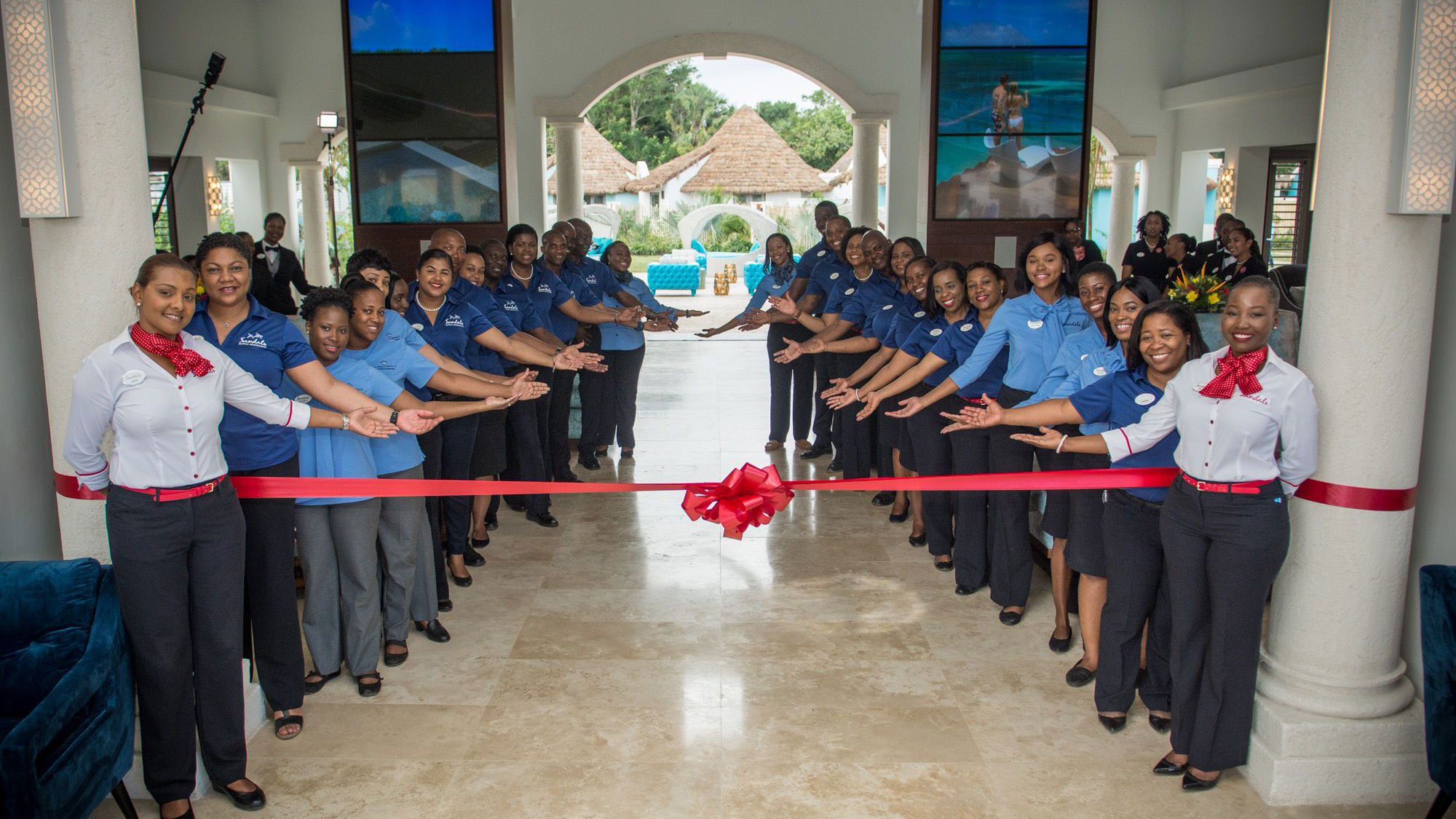Sandals staff at the ribbon-cutting for the Sandals Royal Barbados.