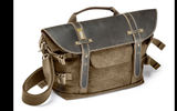 This rugged camera bag can handle an iPad-like notebook but really is designed for those diehard photographers who still take a DSLR or camcorder with them to capture their travel adventures. The Midi Satchel, which is made for National Geographic, is constructed from water-proof cotton with a polyurethane coating and has a leather trim and polyester internal fabric. The khaki-colored bag has a fold-over zippered top cover, shoulder straps and several external pockets.