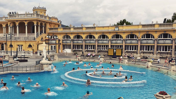 Budapest’s Szechenyi Thermal Baths is ideal for people-watching. Fed by two thermal springs, the bathhouse is more than a century old. Budapest’s Szechenyi Thermal Baths is ideal for people-watching. Fed by two thermal springs, the bathhouse is more than a century old.