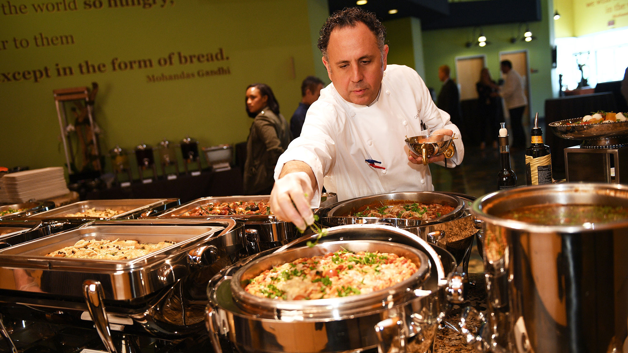 Carlos Guia, the Aria's executive chef of conventions and banquets, helped run a pilot program that donated more than 100,000 pounds of excess food to Three Square.