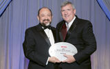 Dario Flota of the Riviera Maya tourism bureau and Travel Weekly's Bob Sullivan.