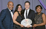 Travel Weekly's Arnie Weissmann, second from right, with Sebastian Maureschal, Pauline Pigott and Nicole Barrett of Sandals, which won in the Caribbean and All-Inclusive categories.