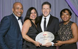 Travel Weekly's Arnie Weissmann, second from right, with Sebastian Maureschal, Pauline Pigott and Nicole Barrett of Sandals, which won in the Caribbean and All-Inclusive categories.