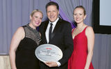 Jaclyn Leibl-Cote and Diana Ditto of Collette with Travel Weekly's Arnie Weissmann. Collette won top Canada tour operator.
