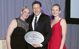 Jaclyn Leibl-Cote and Diana Ditto of Collette with Travel Weekly's Arnie Weissmann. Collette won top Canada tour operator.