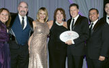 Travel Weekly's Arnie Weissmann (third from right) with, from left, Martha Troncoza, Michael Weldon, Ana Parodi, Michele Saegesser, Erik De La Cruz and Michael Eng of Viking Cruises. Viking repeated its wins in the River Cruising and River Cruise Sales & Service categories.