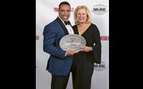 Carlos Garzon and Kate Otto of Regent Seven Seas Cruises, whose Seven Seas Explorer got the nod in the Luxury Ship category.