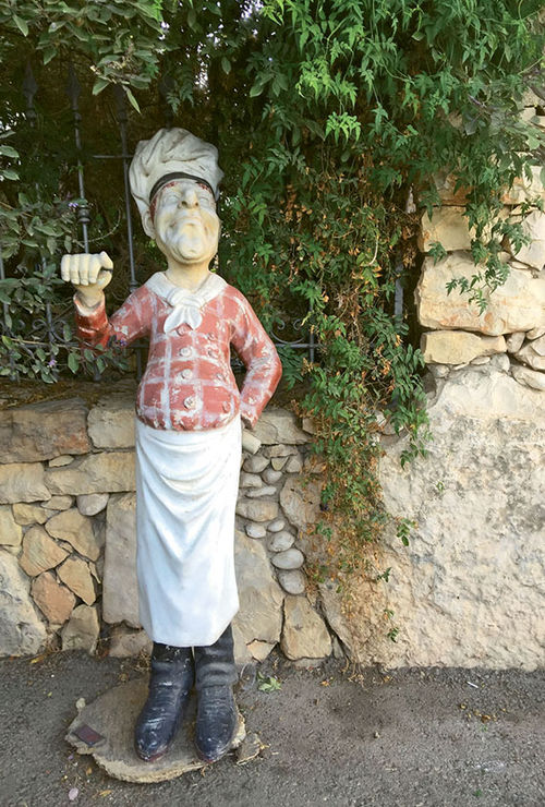 A chef statue greets diners at Abu Gosh restaurant on the square. With plenty of cultural and beach activities, Tel Aviv is ideal for multigenerational travel. A chef statue greets diners at Abu Gosh restaurant on the square. With plenty of cultural and beach activities, Tel Aviv is ideal for multigenerational travel.